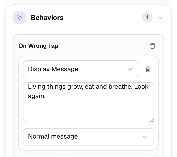 The Behaviors section with an On Wrong Tap behavior whose Display Message action reads Living things grow, eat and breathe. Look again! as a Normal message